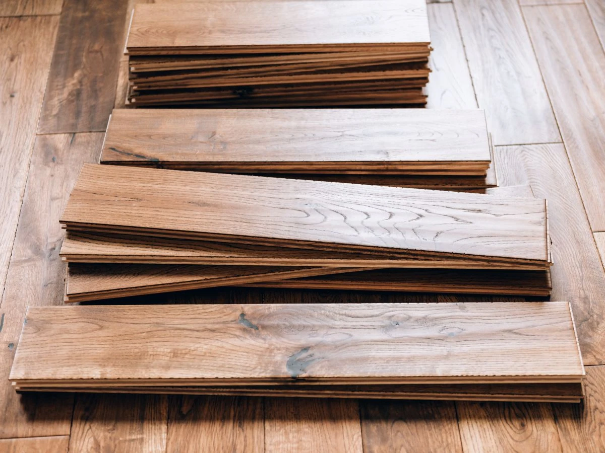 A stack of rustic click oak wood flooring
